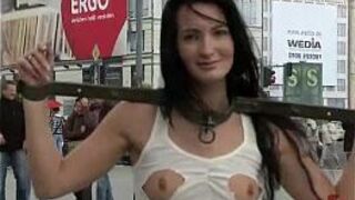 Shackled babe flashing in public - porn video