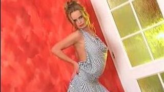 Blonde in black boots and stockings rubs her pussy - porn video